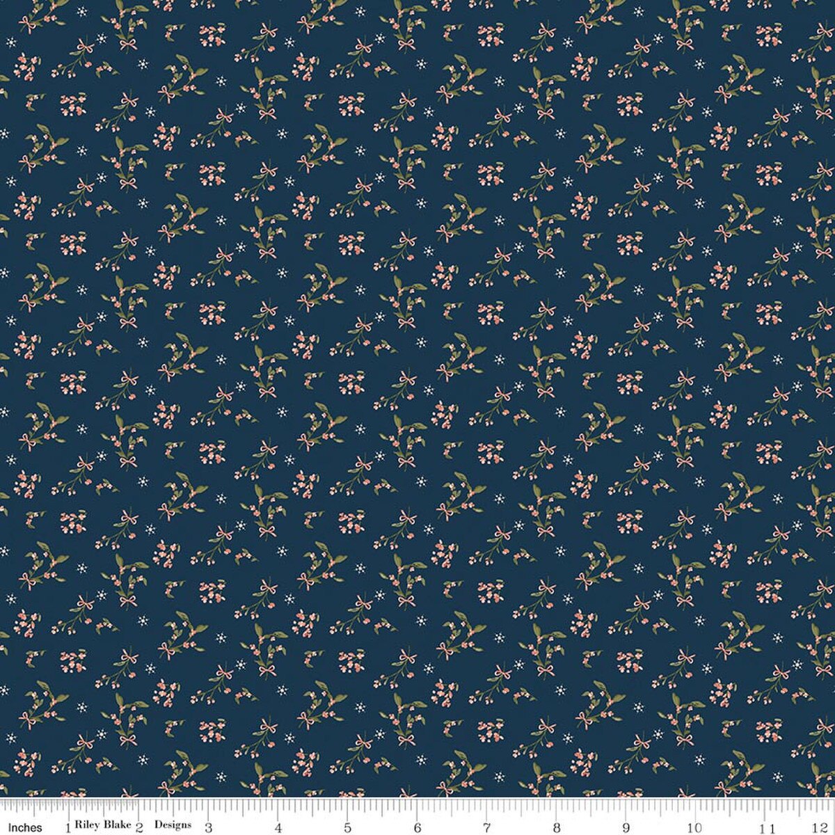 Navy blue fabric with small floral pattern and ruler at the bottom